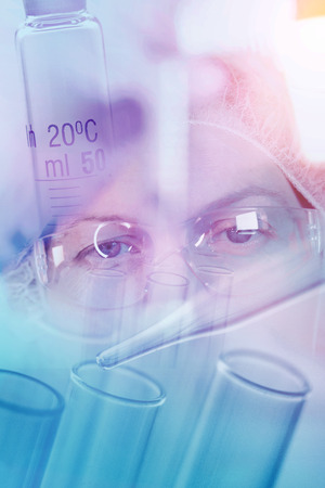 Medical scientist working with laboratory glassware, conceptual image of scientific equipment for researching in medicine and chemistryの写真素材