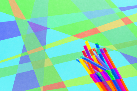 Summer season background, colorful drinking straws on multicolor backgroundの写真素材