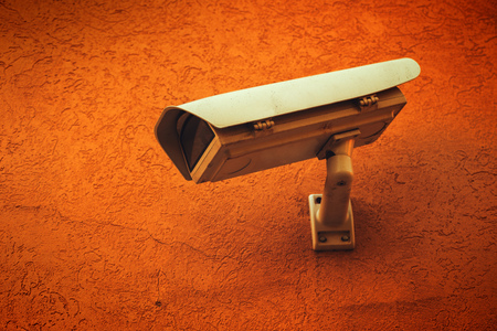 Surveillance CCTV camera in metal housing cover protective case