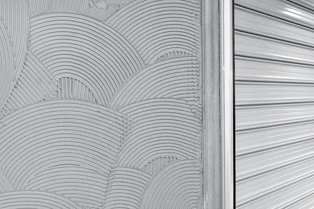 Decorative plaster wall finish texture, modern urban wavy overlapping concentric circle pattern...