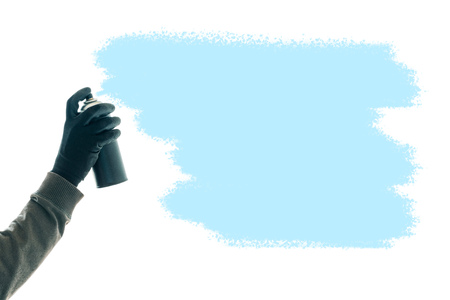 Graffiti paint as copy space, hand with spray can isolated on white background