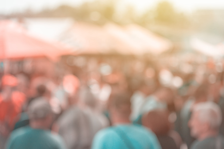Street crowd blur background, group of unrecognizable people on crowded pedestrian walkwayの写真素材