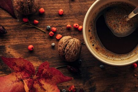 Autumn morning coffee is on the table, close up selective focusの写真素材
