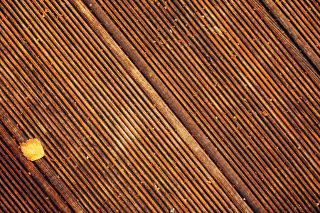 Dirty wooden deck tile flooring top view, abstract background texture