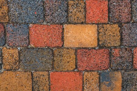 Colorful paving stone background, top view texture