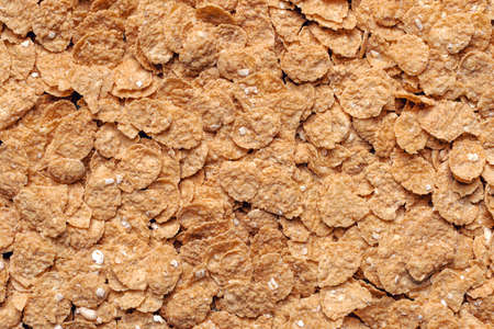 Oat flakes heap, top view. Healthy eating pattern texture seen from above, full frame background