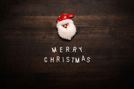 Santa Claus wishes you a Merry Christmas, top view flat lay image with copy space for Xmas holiday...