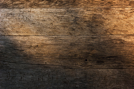 Weathered wooden planks background texture with worn scratched marks, top viewの写真素材