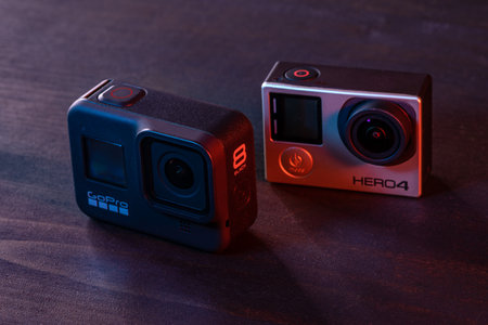 Novi Sad, Serbia, February 15. 2020: GoPro Hero 8 Black and Hero 4 Black action cameras side by...