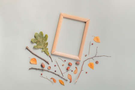 Autumn decoration and blank picture frame for fine art, flat lay top viewの写真素材