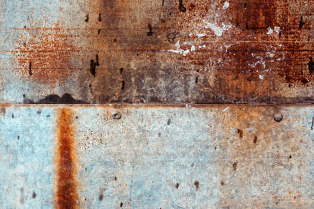 Corroded metal surface texture as background, unique rusty pattern of metallic plateの写真素材