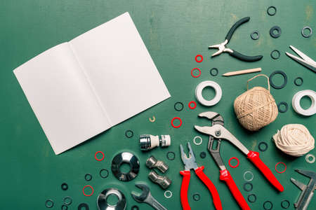 Top view plumbing tools set flat lay and blank notebook copy spaceの写真素材