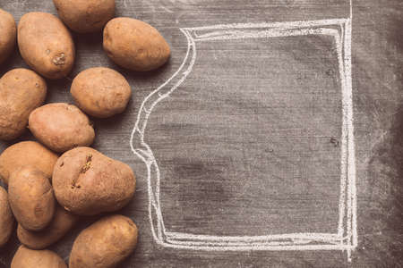 Pile of harvested potato tubers with copy space, selective focusの写真素材