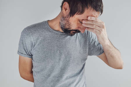 Memory lapse, adult caucasian male with inability to remember, confused and concernedの写真素材