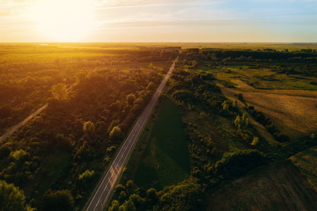 Beautiful aerial view of scenic countryside in summer sunset from drone pov, Banat region in...