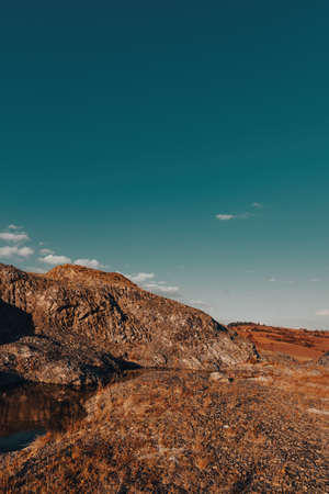 Barren rocky Zlatibor mountain landscape with sky in backgroundの写真素材