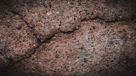 Cracked damaged concrete surface as background, top view texture