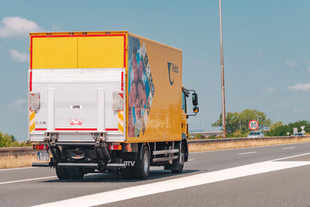 ZAGREB, CROATIA, JULY 20. 2021: Croatian Post (Hrvatska Posta) delivery truck on highway road near Zagreb, illustrative editorial. Croatian Post normally delivers 90% of parcels the next day.のeditorial素材