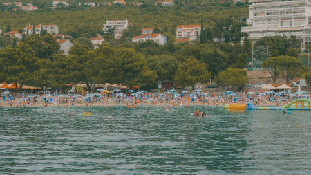 CRIKVENICA, CROATIA - July 26, 2021: Town of Crikvenica in Kvarner bay area of Croatian part of Adriatic sea seen from the tourist boatのeditorial素材