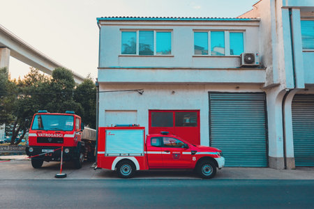 CRIKVENICA, CROATIA - July 28, 2021: CRikvenica fire service department vehicles parked in front of the buildingのeditorial素材