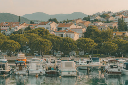 CRIKVENICA, CROATIA - July 25, 2021: Boats in Crikvenica marina moored to docks of Kvarner bayのeditorial素材