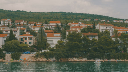 CRIKVENICA, CROATIA - July 26, 2021: Town of Crikvenica in Kvarner bay area of Croatian part of Adriatic sea seen from the tourist boatのeditorial素材