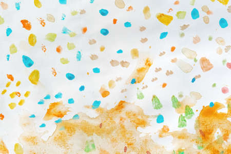 Watercolor splash and stain pattern as background on white paperの写真素材