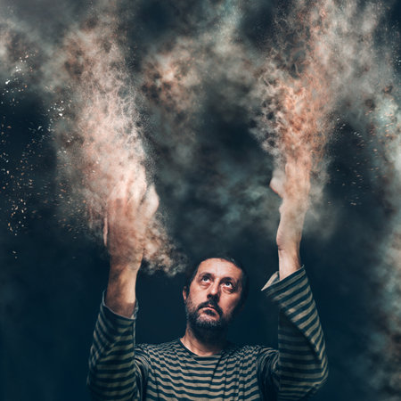 Dissolving in sand and disappearing, religious concept for dying and leaving this world, man with...