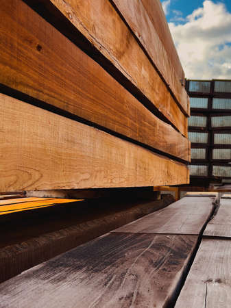 Stacked railway sleepers made of oak hardwood material ready for installationの写真素材