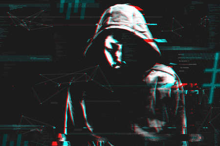 Computer hacker and cyber criminal, digitally enhanced image with grunge and glitch effect. Cyebrcrime and data breach concept.の写真素材