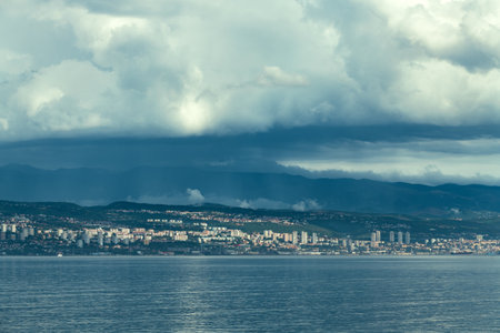 Croatian town of Rijeka in Kvarner gulf of Adriatic sea before the sudden rain storm in summerの写真素材