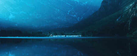 Ukanc, small settlement at western shore of Lake Bohinj in Slovenia surrounded by mountains Vogel and Vogarの写真素材