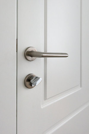 White door knob and handle, selective focusの写真素材