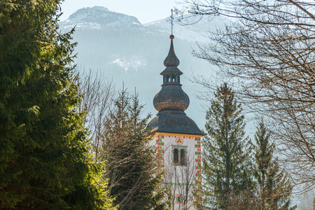 Church of St. John the Baptist by the Bohinj Lake in Ribcev Laz, Slovenia. 700 years old example of Slovenian medieval architecture.の写真素材