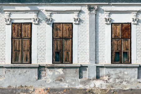 Old house with closed wooden shutters, architecture in Vojvodinaの写真素材