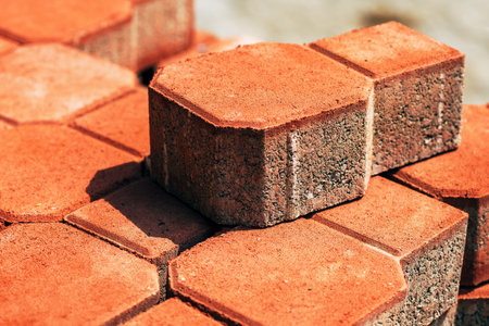 Concrete paving slabs on the street for sidewalk reconstruction, selective focus