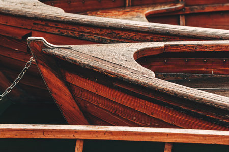 Wooden dinghy boats on Lake Bohinj in Slovenia, selective focus