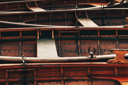 Wooden dinghy boats on Lake Bohinj in Slovenia, selective focus