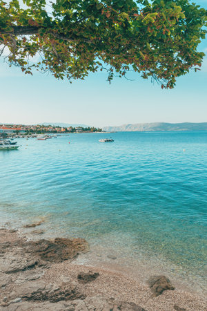 Beautiful summer morning view of Selce, picturesque village in Kvarner bay at Adriatic sea coast, selective focusの写真素材