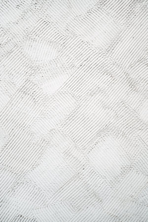 Rough stucco wall pattern and texture as background and design element