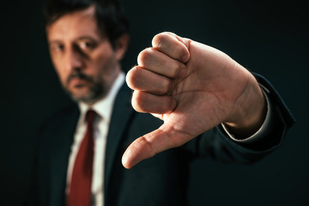 Dislike concept, politician gesturing thumbs down, unsatisfied male displaying negative emotion,...