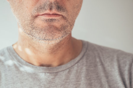 Male chin and jawline, closeup of unshaven man's face, selective focusの写真素材