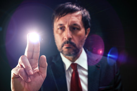 Politician pushing virtual screen interface, selective focus