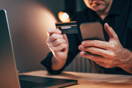 Electronic banking concept, e-banking with credit card, mobile phone and laptop computer, selective focusの写真素材