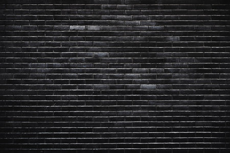 Black brick wall pattern and background, texture of dark brickwork facade as copy spaceの写真素材