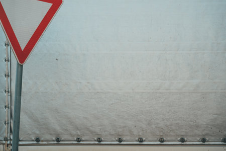 Give way traffic sign with copy space, minimalist compositionの写真素材