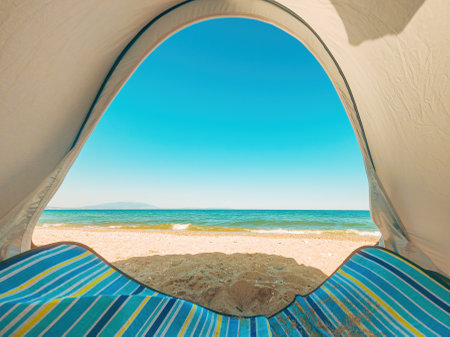 View of the horizon over ocean water from sun tent on the beach, selective focusの写真素材