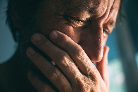 Emotional distraught sad man crying stressed, dealing with mental health problems, depression,...