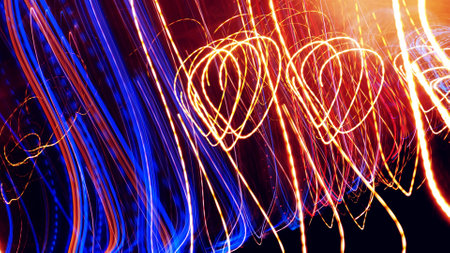 Long exposure light streaks of city lamps and vehicle traffic lights as abstract background,...