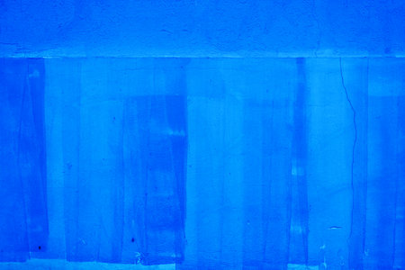 Blue concrete wall as grunge texture and background, abstract design backdropの写真素材